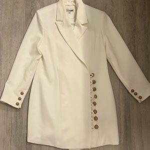 Sexy blazer mini dress. All buttons functional. Never worn.